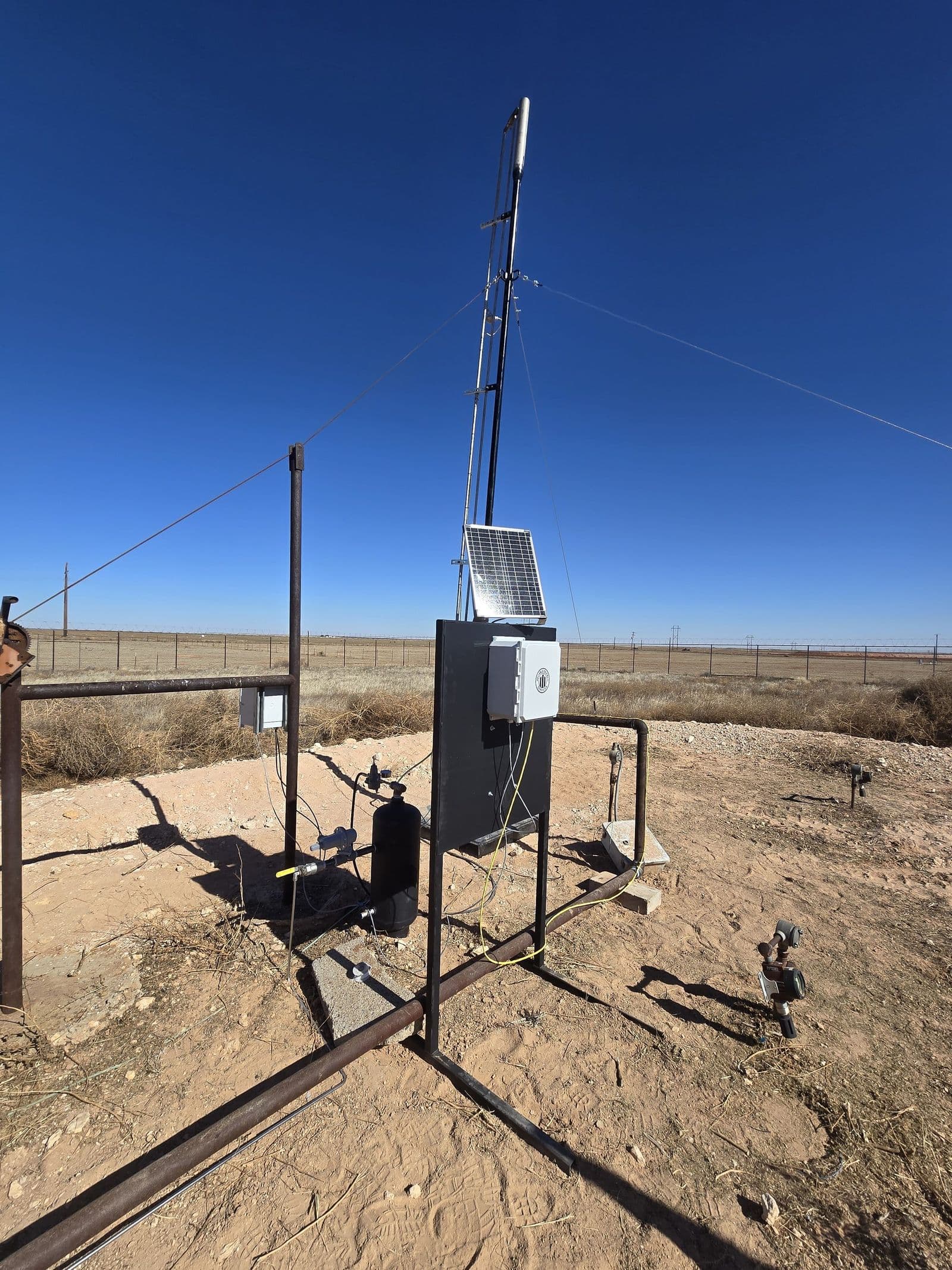 ROS solar-powered Wi-Fi BMS controller installed on a Permian pad