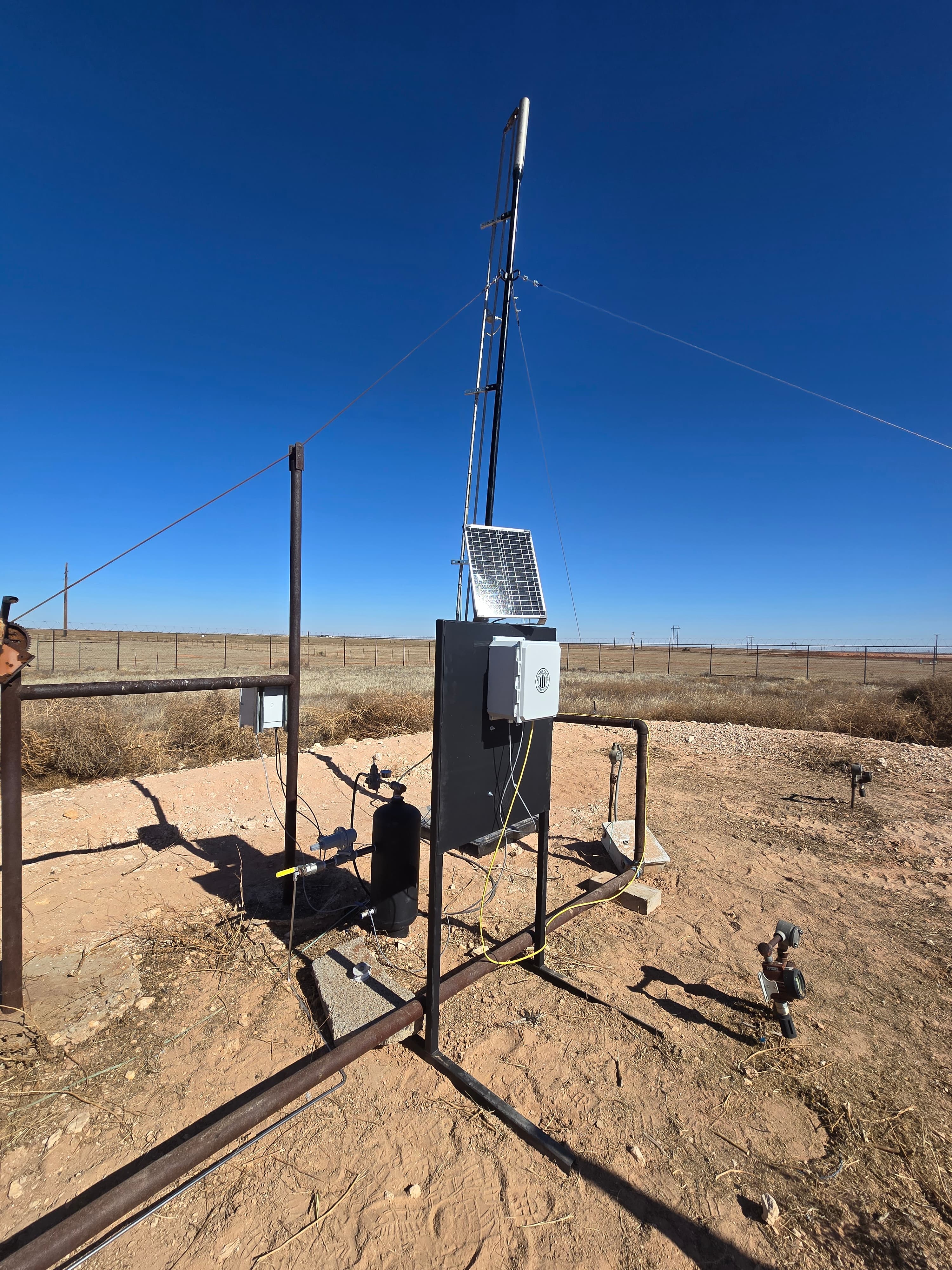 ROS solar-powered Wi-Fi BMS controller installed on a Permian pad