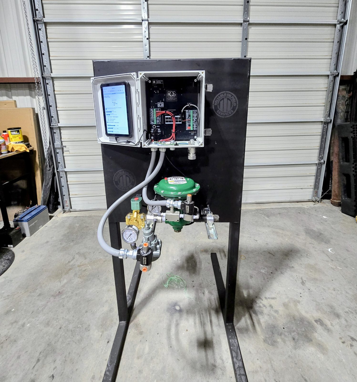 ROS heater treater quick-connect unit — BMS enclosure with touchscreen and complete gas train on a welded steel stand